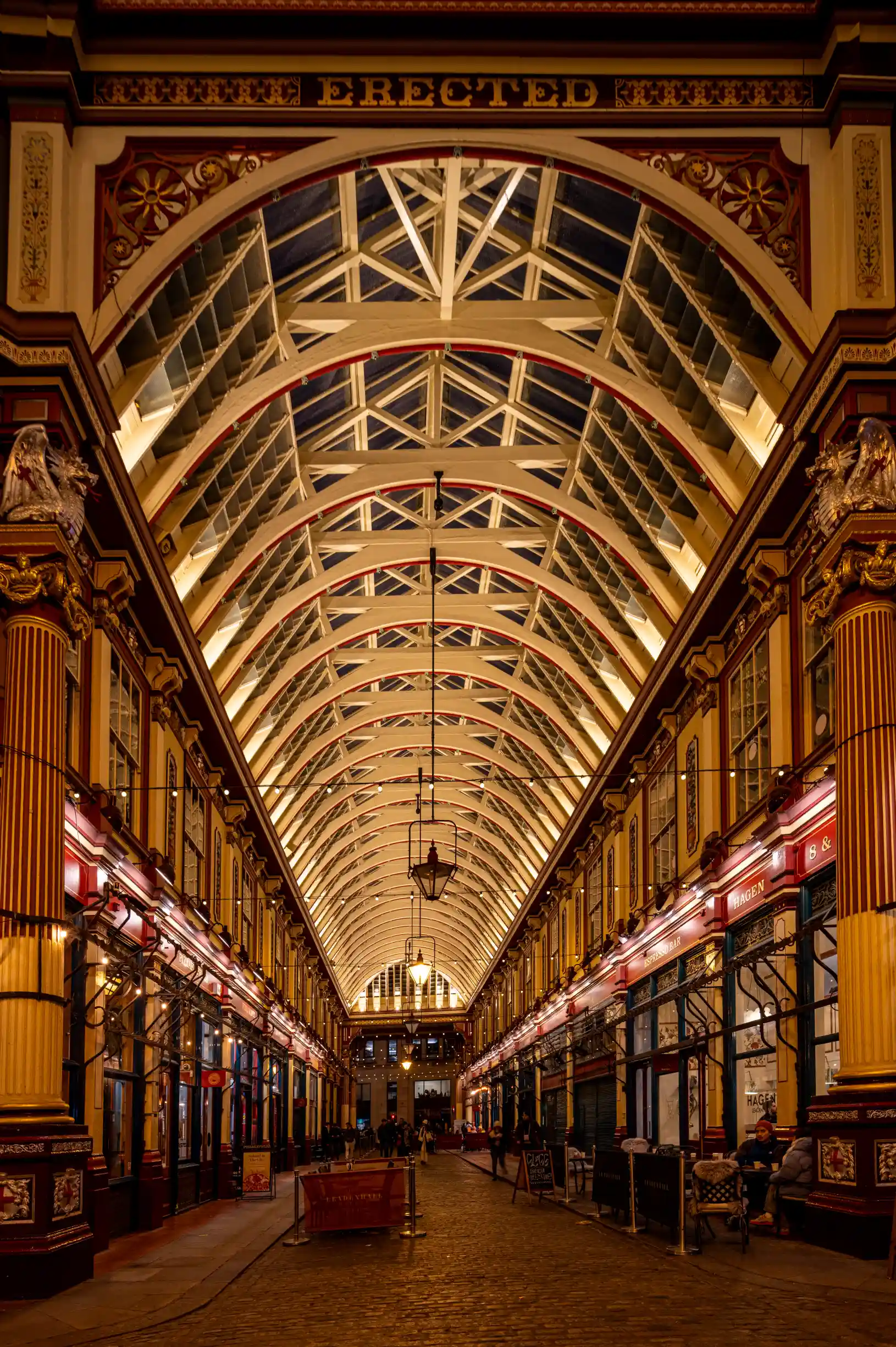 Old street covered in ivy and coffee shops and vintage boutiques.